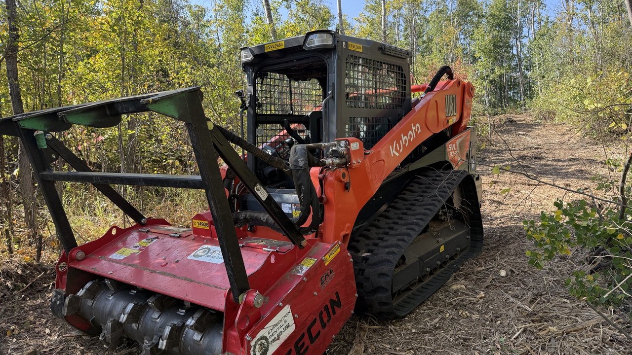 Kubota SVL97-3 with FECON mulcher on corridor